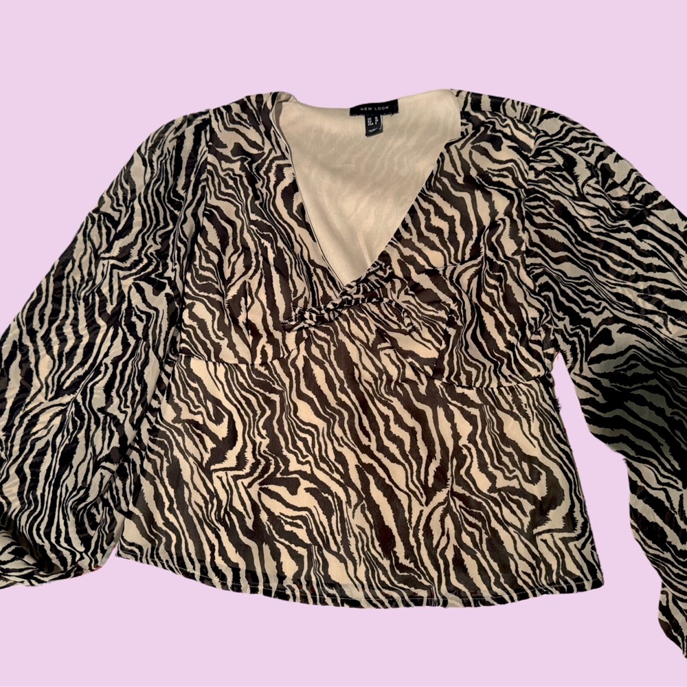 Long-sleeved animal print blouse